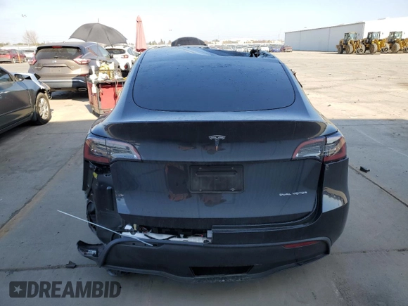2024 Tesla Model Y Long Range with VIN 7SAYGDEE6RF063230, listed as a Copart auction lot 42872535 with Not Provided miles and Salvage Title. Bid and sale history available at DreamBid. Image 6.