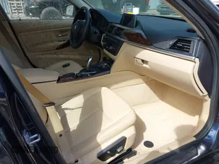 2013 BMW 3 Series 328i xDrive with VIN WBA3B5G59DNS01455, listed as a IAAI auction lot 41788947 with 127,677 mi miles. Bid and sale history available at carsss.com. Image 5.