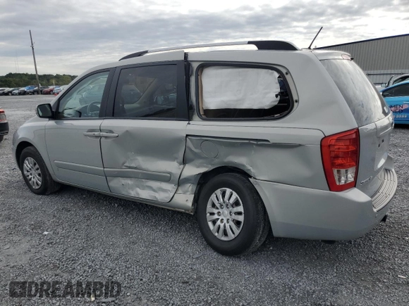 2012 Kia Sedona LX with VIN KNDMG4C77C6456849, listed as a Copart auction lot 69638314 with 206,434 mi miles and Salvage Title. Bid and sale history available at carsss.com. Image 2.