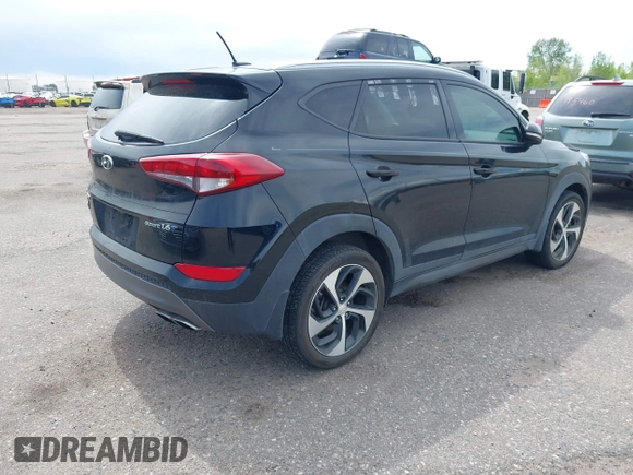 2016 Hyundai Tucson Limited with VIN KM8J33A27GU181240, listed as a IAAI auction lot 42183028 with 104,557 mi miles. Bid and sale history available at carsss.com. Image 4.