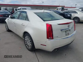 2012 Cadillac CTS Luxury with VIN 1G6DF5E50C0131857, listed as a IAAI auction lot 42610389 with 85,896 mi miles and . Bid and sale history available at DreamBid. Image 3.