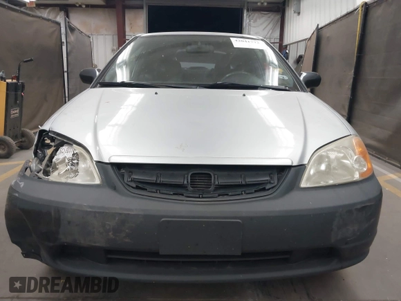 2003 Honda Civic LX with VIN 1HGEM22573L012729, listed as a IAAI auction lot 42041772 with 157,207 mi miles. Bid and sale history available at carsss.com. Image 12.