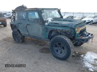 2010 Jeep Wrangler Unlimited Sport with VIN 1J4BA3H12AL230749, listed as a IAAI auction lot 41052278 with 156,217 mi miles. Bid and sale history available at carsss.com. Image 1.