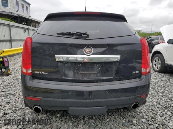 2014 Cadillac SRX Performance Collection with VIN 3GYFNFE33ES687941, listed as a Copart auction lot 57726675 with 164,059 mi miles and Clean title. Bid and sale history available at DreamBid. Image 6.