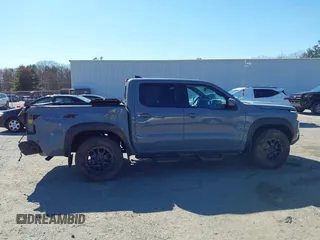 2022 Nissan Frontier SV z VIN 1N6ED1EKXNN659026, wystawiony jako IAAI lot #42050476 z przebiegiem 26 183 mil mil oraz . Historia ofert i sprzedaży dostępna na DreamBid. Obrazek 14.