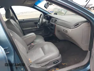2006 Ford Taurus with VIN 1FAHP56U96A216511, listed as a IAAI auction lot 41449371 with Not provided miles and . Bid and sale history available at DreamBid. Image 5.