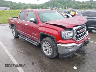 2018 GMC Sierra 1500 SLT z VIN 3GTU2NEC9JG585363, wystawiony jako IAAI lot #42234064 z przebiegiem 71 715 mil mil oraz . Historia ofert i sprzedaży dostępna na DreamBid. Obrazek 1.