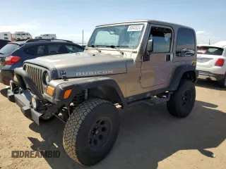 2004 Jeep Wrangler Rubicon with VIN 1J4FA69S64P751349, listed as a Copart auction lot 69642624 with 160,589 mi miles and Salvage Title. Bid and sale history available at carsss.com. Image 1.