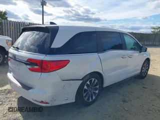 2024 Honda Odyssey EX-L with VIN 5FNRL6H65RB007535, listed as a IAAI auction lot 40602982 with 6,097 mi miles and . Bid and sale history available at DreamBid. Image 4.