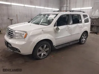 2012 Honda Pilot Touring with VIN 5FNYF4H9XCB035551, listed as a IAAI auction lot 41668893 with 1 mi miles. Bid and sale history available at carsss.com. Image 2.