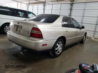 1995 Honda Accord EX w/Leather with VIN 1HGCD5650SA112202, listed as a Copart auction lot 65955974 with 231,992 mi miles and Salvage Title. Bid and sale history available at carsss.com. Image 3.