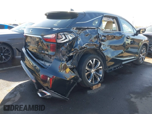 2017 Lexus RX with VIN 2T2BZMCA4HC077090, listed as a IAAI auction lot 41622982 with 83,683 mi miles. Bid and sale history available at carsss.com. Image 4.