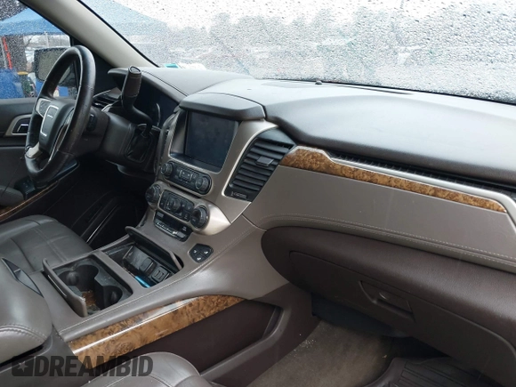2016 GMC Yukon Denali with VIN 1GKS2CKJ2GR144167, listed as a IAAI auction lot 41953465 with 89,209 mi miles. Bid and sale history available at carsss.com. Image 5.