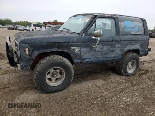 1984 Ford Bronco z VIN 1FMCU14S4EUC99166, wystawiony jako Copart lot #87559525 z przebiegiem 354 718 mil mil oraz Czysty tytuł • Clean title. Historia ofert i sprzedaży dostępna na DreamBid. Obrazek 1.