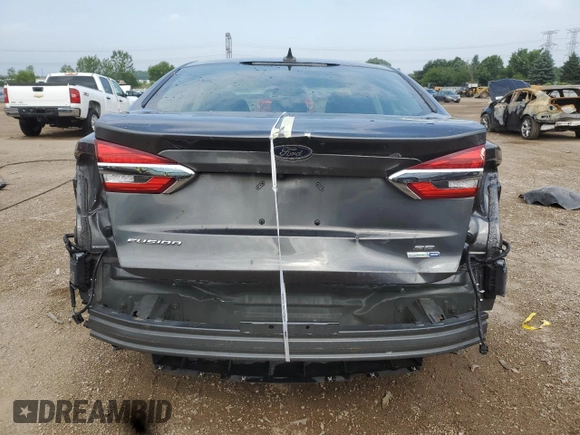 2020 Ford Fusion SE with VIN 3FA6P0T90LR247593, listed as a Copart auction lot 59741115 with 155,658 mi miles and Salvage title. Bid and sale history available at DreamBid. Image 6.
