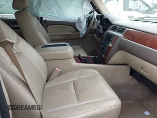 2009 Chevrolet Tahoe LTZ with VIN 1GNFK33079R293963, listed as a IAAI auction lot 41662695 with 185,408 mi miles and . Bid and sale history available at DreamBid. Image 5.