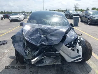 2025 Tesla Model 3 Long Range z VIN 5YJ3E1EBXSF909124, wystawiony jako IAAI lot #42015297 z przebiegiem Nie podano mil oraz . Historia ofert i sprzedaży dostępna na DreamBid. Obrazek 6.