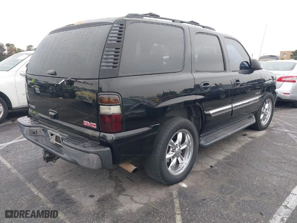2006 GMC Yukon SLT with VIN 1GKEC13V46R138398, listed as a IAAI auction lot 41778033 with 158,568 mi miles. Bid and sale history available at carsss.com. Image 4.