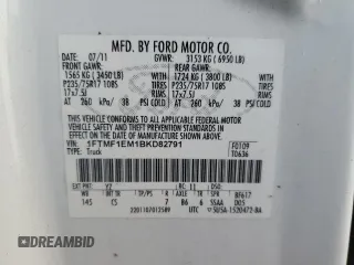 2011 Ford F-150 XL with VIN 1FTMF1EM1BKD82791, listed as a Copart auction lot 82148724 with 76,928 mi miles and Clean title. Bid and sale history available at DreamBid. Image 12.