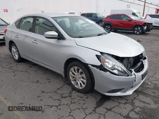 2019 Nissan Sentra S z VIN 3N1AB7AP2KY298713, wystawiony jako IAAI lot #41802639 z przebiegiem 40 559 mil mil oraz . Historia ofert i sprzedaży dostępna na DreamBid. Obrazek 1.