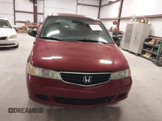 2002 Honda Odyssey LX z VIN 5FNRL18552B019426, wystawiony jako IAAI lot #41738214 z przebiegiem 202 577 mil mil oraz . Historia ofert i sprzedaży dostępna na DreamBid. Obrazek 6.