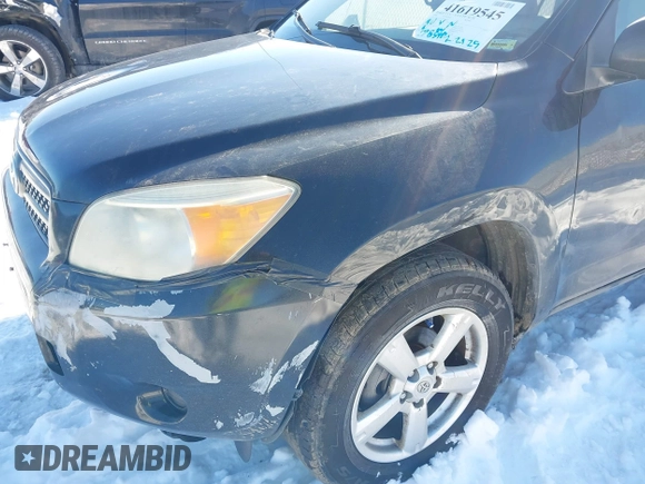 2006 Toyota RAV4 with VIN JTMZD33V065016103, listed as a IAAI auction lot 41619545 with 198,590 mi miles. Bid and sale history available at carsss.com. Image 6.