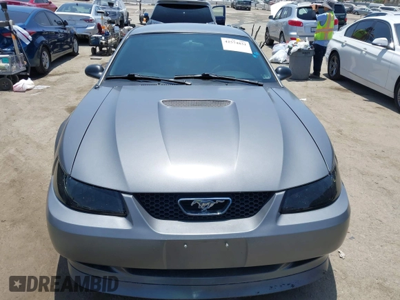 1999 Ford Mustang with VIN 1FAFP4046XF202967, listed as a IAAI auction lot 42574831 with 138,068 mi miles and . Bid and sale history available at DreamBid. Image 12.