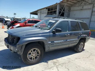 2004 Jeep Grand Cherokee Laredo with VIN 1J4GX48N54C371073, listed as a Copart auction lot 52202855 with 212,368 mi miles and Salvage Title. Bid and sale history available at carsss.com. Image 1.