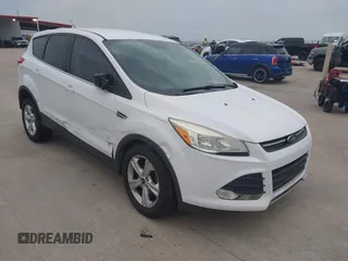 2016 Ford Escape SE z VIN 1FMCU0G79GUC41641, wystawiony jako IAAI lot #42103256 z przebiegiem 153 792 mil mil oraz . Historia ofert i sprzedaży dostępna na DreamBid. Obrazek 1.