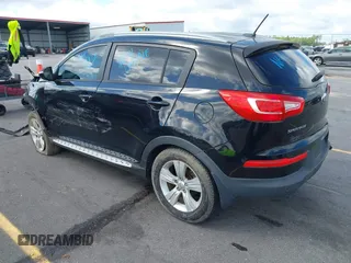 2013 Kia Sportage LX with VIN KNDPB3A27D7428624, listed as a IAAI auction lot 42006497 with 91,244 mi miles. Bid and sale history available at carsss.com. Image 3.