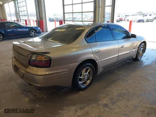 2000 Pontiac Bonneville SLE with VIN 1G2HY54K5Y4247995, listed as a IAAI auction lot 41439728 with 212,048 mi miles. Bid and sale history available at carsss.com. Image 4.