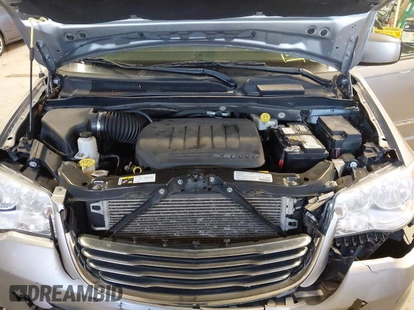 2013 Chrysler Town & Country Touring with VIN 2C4RC1BG1DR646691, listed as a IAAI auction lot 42051933 with 162,960 mi miles. Bid and sale history available at carsss.com. Image 10.