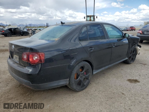 2009 Volkswagen Jetta GLI z VIN 3VWDJ71K79M042969, wystawiony jako Copart lot #50803665 z przebiegiem 191 689 mil mil oraz Szkoda całkowita • Salvage title. Historia ofert i sprzedaży dostępna na DreamBid. Obrazek 3.