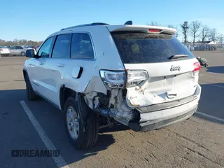 2019 Jeep Grand Cherokee Laredo E with VIN 1C4RJFAG7KC694674, listed as a IAAI auction lot 41591678 with 61,144 mi miles. Bid and sale history available at carsss.com. Image 3.