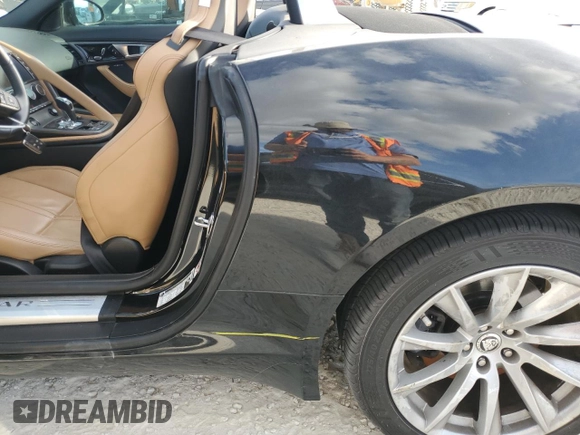 2014 Jaguar F-Type V6 with VIN SAJWA6E74E8K06478, listed as a Copart auction lot 76975894 with Not Provided miles and Salvage Title. Bid and sale history available at DreamBid. Image 12.