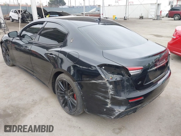 2021 Maserati Ghibli S with VIN ZAM57YSA3M1365483, listed as a IAAI auction lot 42562390 with 51,954 mi miles and . Bid and sale history available at DreamBid. Image 3.