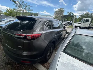 2016 Mazda CX-9 Touring с VIN JM3TCACY7G0115773, выставлен на аукционе Copart как лот 60667065 с пробегом 119 432 миль миль и Чистый • Clean title. История ставок и продаж доступна на DreamBid. Изображение 4.