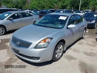 2007 Nissan Altima 2.5 with VIN 1N4AL21E27C138140, listed as a IAAI auction lot 42083098 with 189,799 mi miles. Bid and sale history available at carsss.com. Image 2.