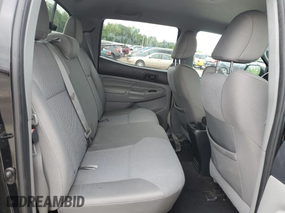 2013 Toyota Tacoma z VIN 5TFLU4EN1DX066986, wystawiony jako Copart lot #55480735 z przebiegiem 165 991 mil mil oraz Szkoda całkowita • Salvage title. Historia ofert i sprzedaży dostępna na DreamBid. Obrazek 10.