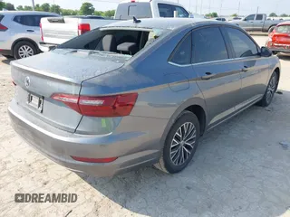 2021 Volkswagen Jetta S z VIN 3VWC57BU0MM093075, wystawiony jako IAAI lot #42067395 z przebiegiem 24 930 mil mil oraz . Historia ofert i sprzedaży dostępna na DreamBid. Obrazek 4.