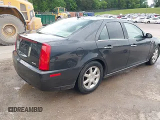 2008 Cadillac STS RWD with VIN 1G6DK67V980165768, listed as a IAAI auction lot 42185454 with 214,813 mi miles and . Bid and sale history available at DreamBid. Image 4.