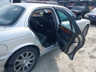 2004 Jaguar XJ 8 z VIN SAJWA71C24SG32778, wystawiony jako IAAI lot #42265164 z przebiegiem 155 872 mil mil oraz . Historia ofert i sprzedaży dostępna na DreamBid. Obrazek 8.