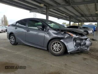 2020 Toyota Prius LE with VIN JTDL9RFU2L3015992, listed as a Copart auction lot 52042125 with 160,995 mi miles and Clean Title. Bid and sale history available at DreamBid. Image 4.