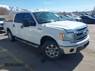 2014 Ford F-150 XL with VIN 1FTFW1ET4EFA29894, listed as a IAAI auction lot 41761318 with 202,115 mi miles. Bid and sale history available at carsss.com. Image 1.