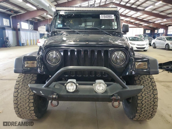 2004 Jeep Wrangler Sport with VIN 1J4FA49S64P722986, listed as a Copart auction lot 51840985 with 129,761 mi miles and Clean Title. Bid and sale history available at carsss.com. Image 5.