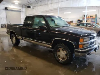 1997 Chevrolet Silverado 1500 with VIN 2GCEK19R4V1278872, listed as a Copart auction lot 51517895 with 250,814 mi miles and Salvage Title. Bid and sale history available at DreamBid. Image 4.