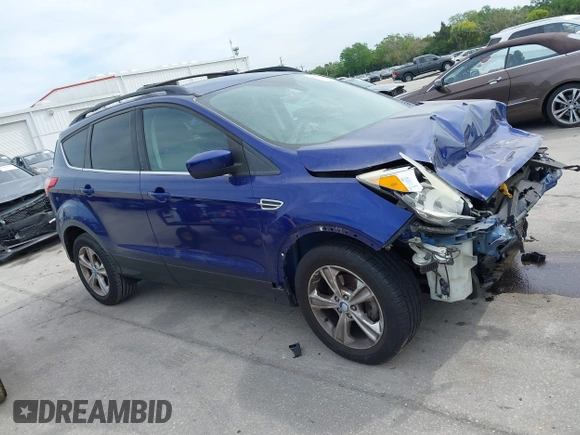 2013 Ford Escape SE with VIN 1FMCU0GXXDUB85818, listed as a IAAI auction lot 41848033 with 128,638 mi miles and . Bid and sale history available at DreamBid. Image 13.