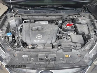 2015 Mazda CX-5 Touring with VIN JM3KE4CY6F0510002, listed as a IAAI auction lot 42045284 with 88,949 mi miles and . Bid and sale history available at DreamBid. Image 10.