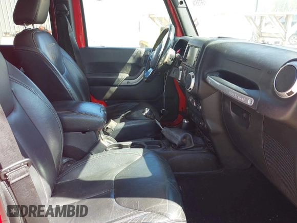 2015 Jeep Wrangler Unlimited Rubicon Hard Rock with VIN 1C4HJWFG9FL525556, listed as a IAAI auction lot 41973576 with 246,949 mi miles and . Bid and sale history available at DreamBid. Image 5.