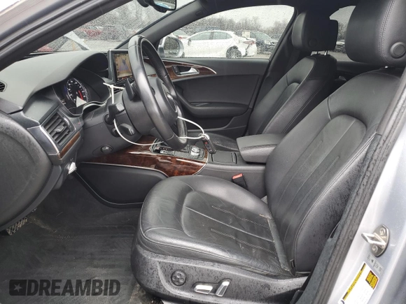 2016 Audi A6 Premium Plus with VIN WAUGFAFC8GN016509, listed as a Copart auction lot 52163905 with 136,724 mi miles and Salvage title. Bid and sale history available at DreamBid. Image 7.
